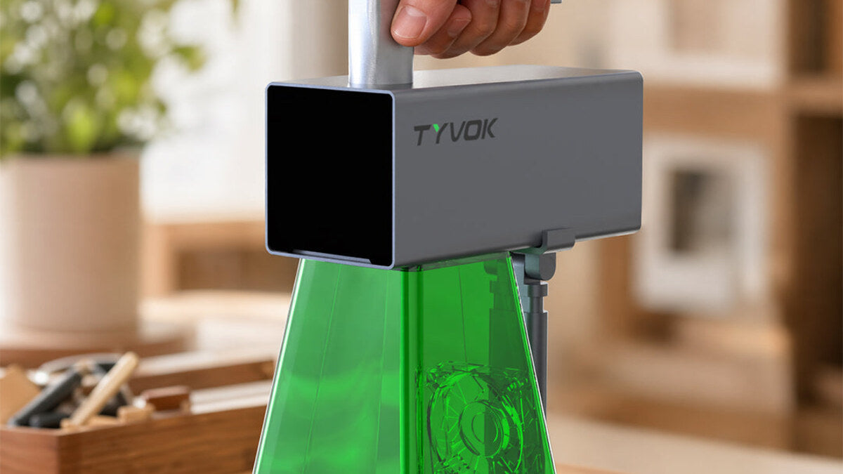 TYVOK P2 compact laser engraver in a desktop workshop